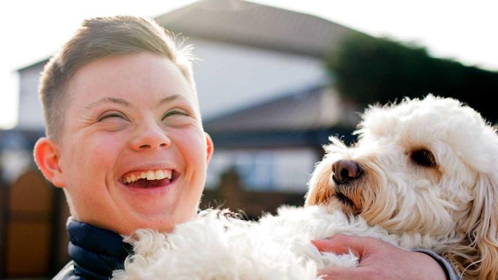 A child with a dog